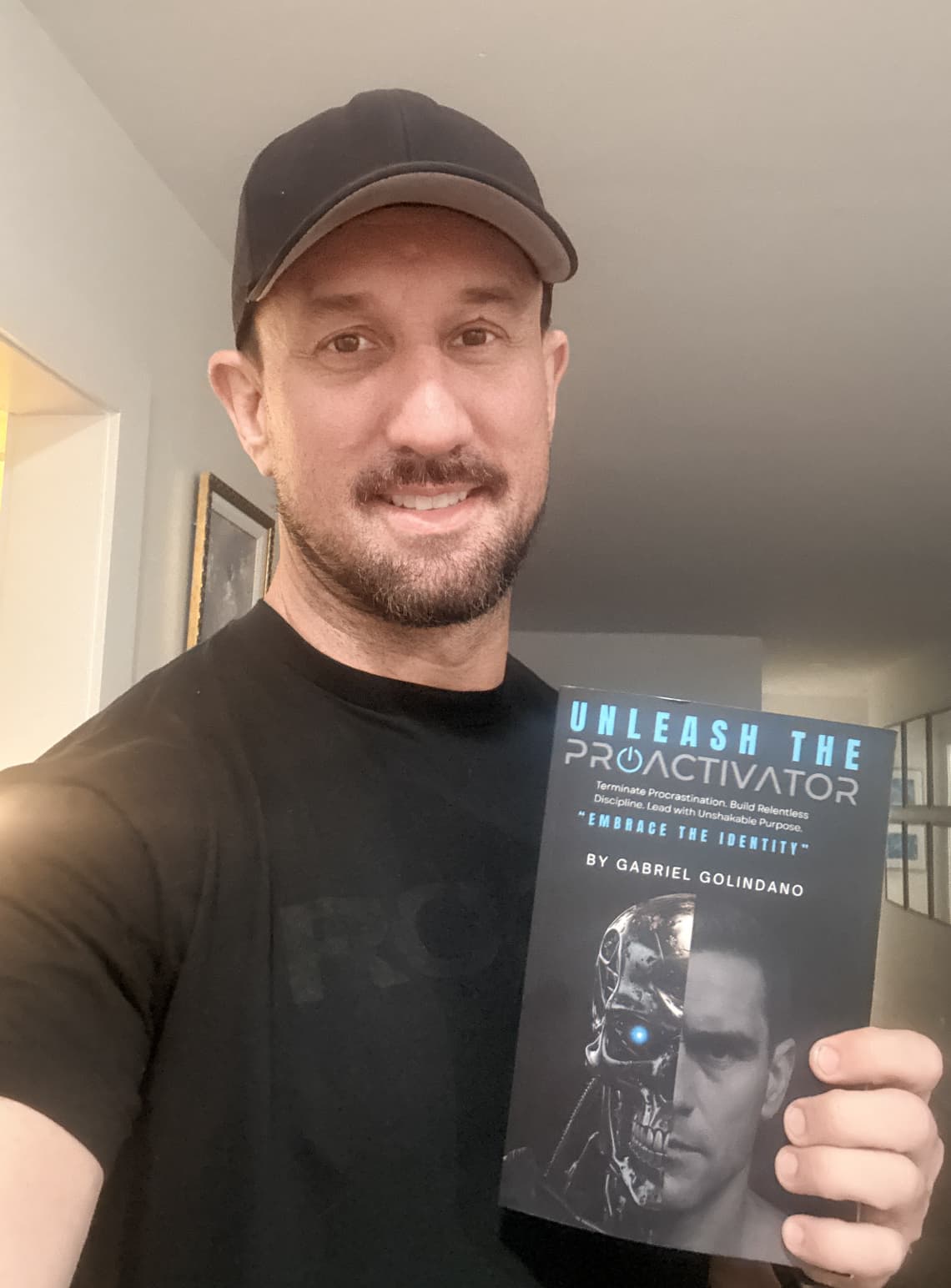 Reader with their copy of Unleash The ProActivator